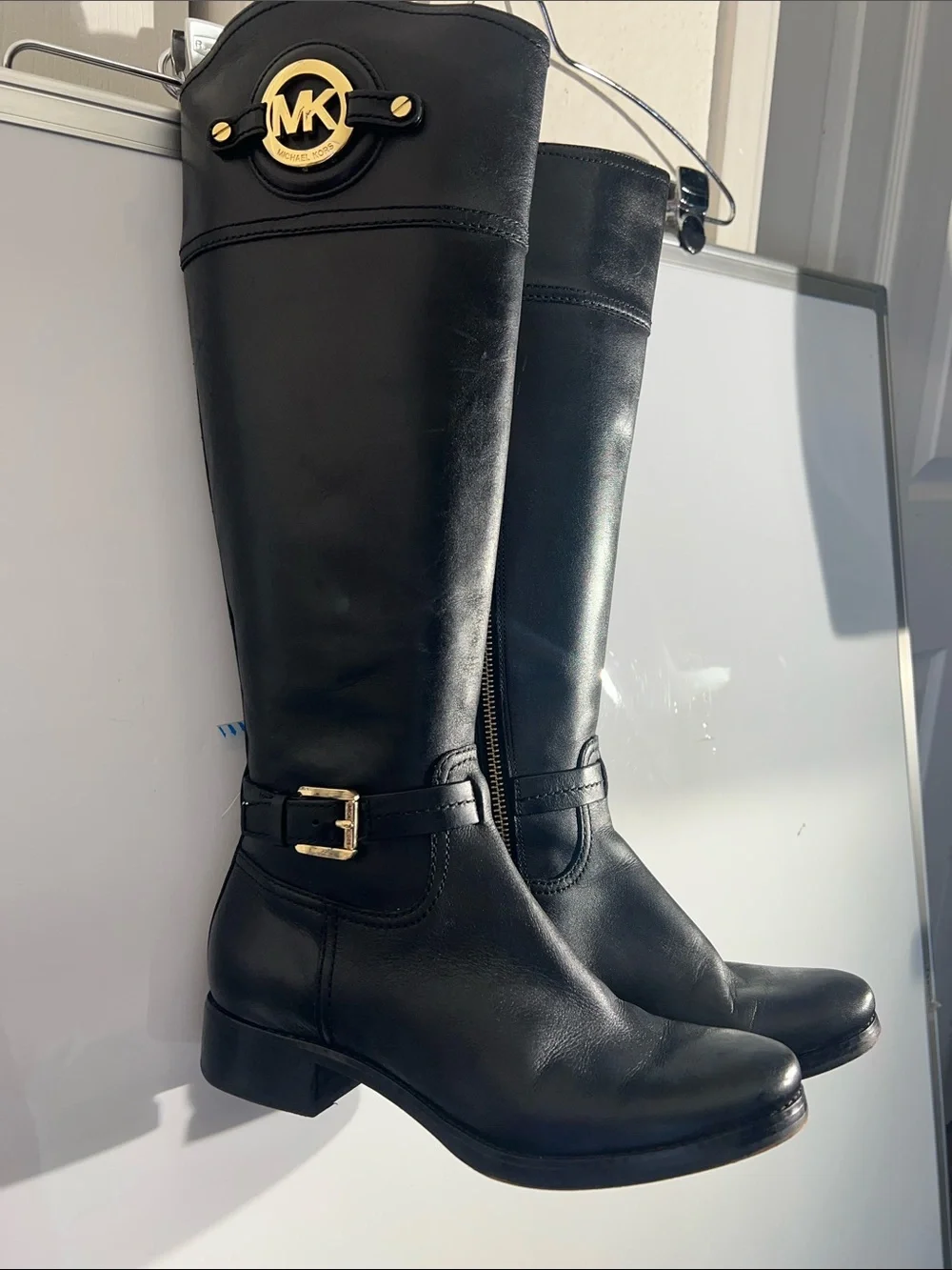 Knee-high leather boots with MK logo